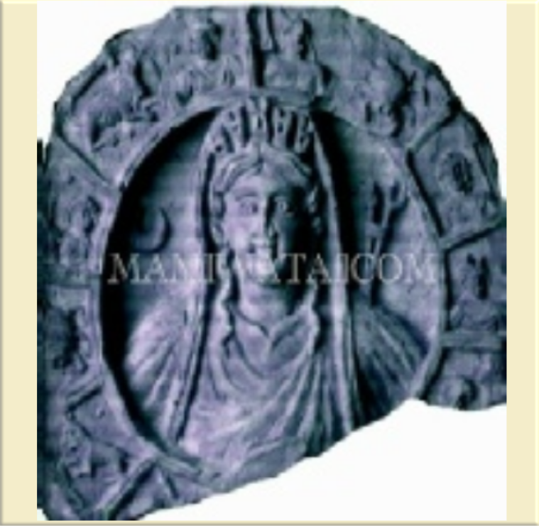 Stone model of Mama Tchamba in Zodiacal Wheel of Fortune.