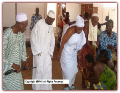 Mama Zogbe in Ceremony. 